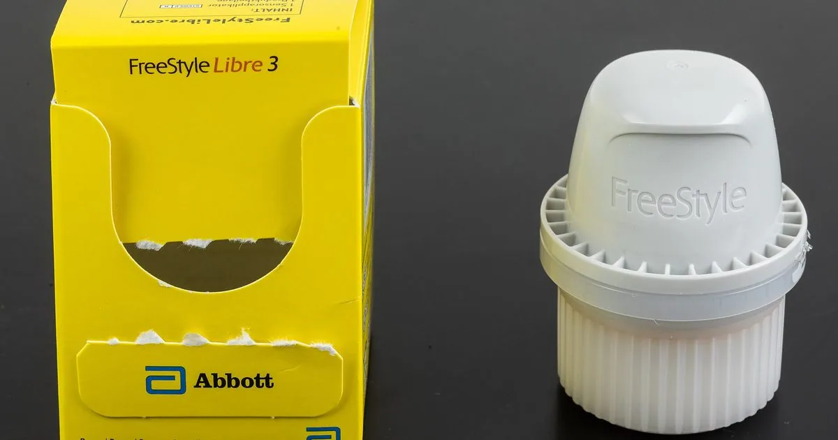 FreeStyle Libre 3 glucose sensor applicator next to its box